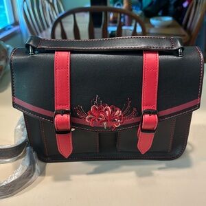Brand new purse black and red never used